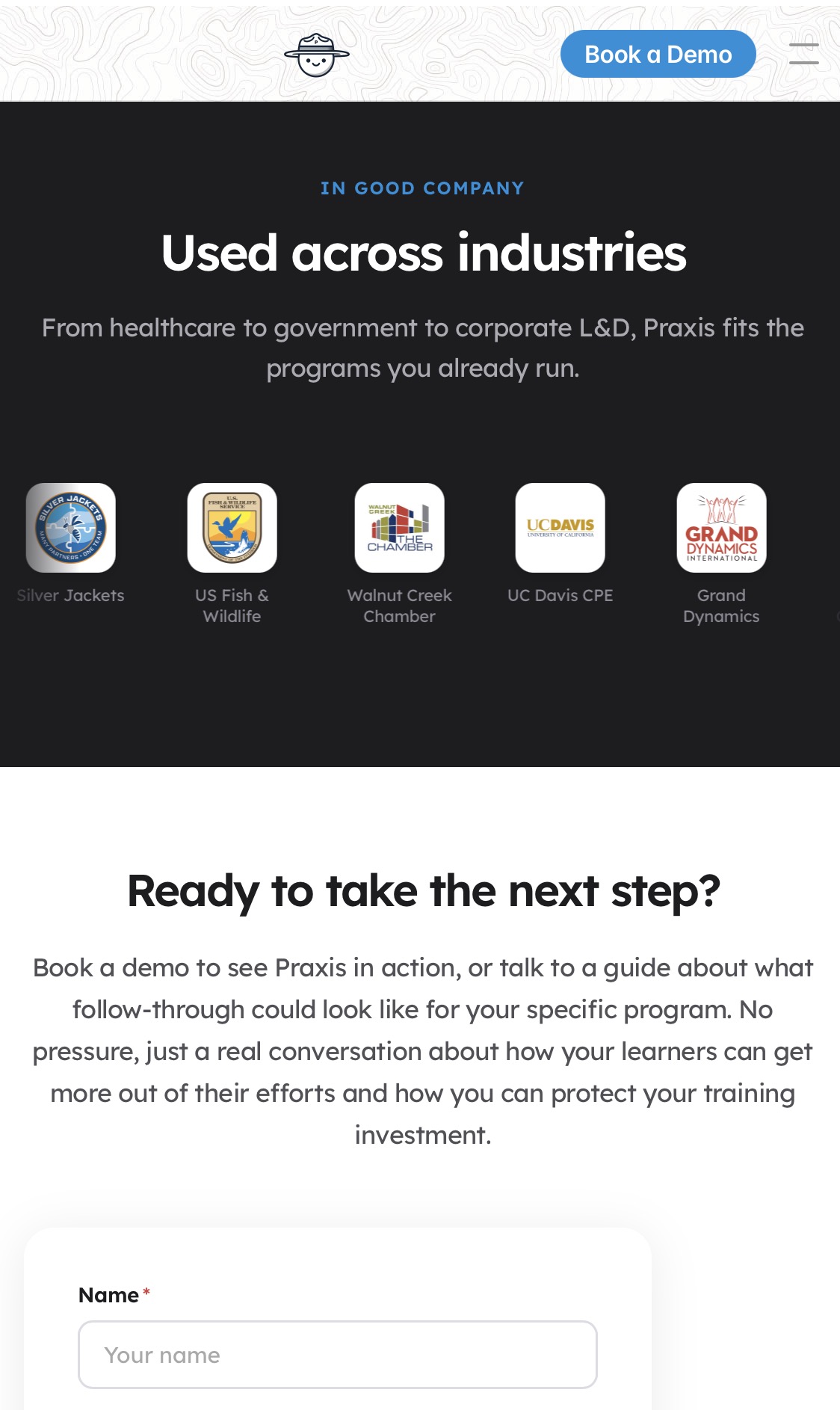 PraxisLearning mobile view: Used across industries section with customer logos including US Fish and Wildlife and UC Davis CPE, above the demo request form